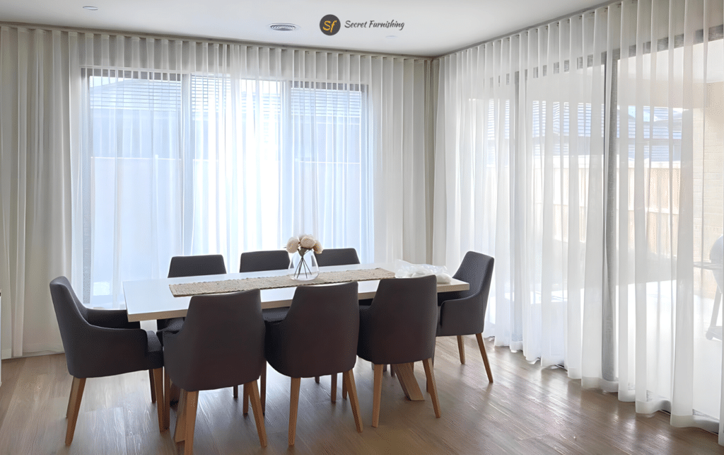 s fold curtains installed in a dining room